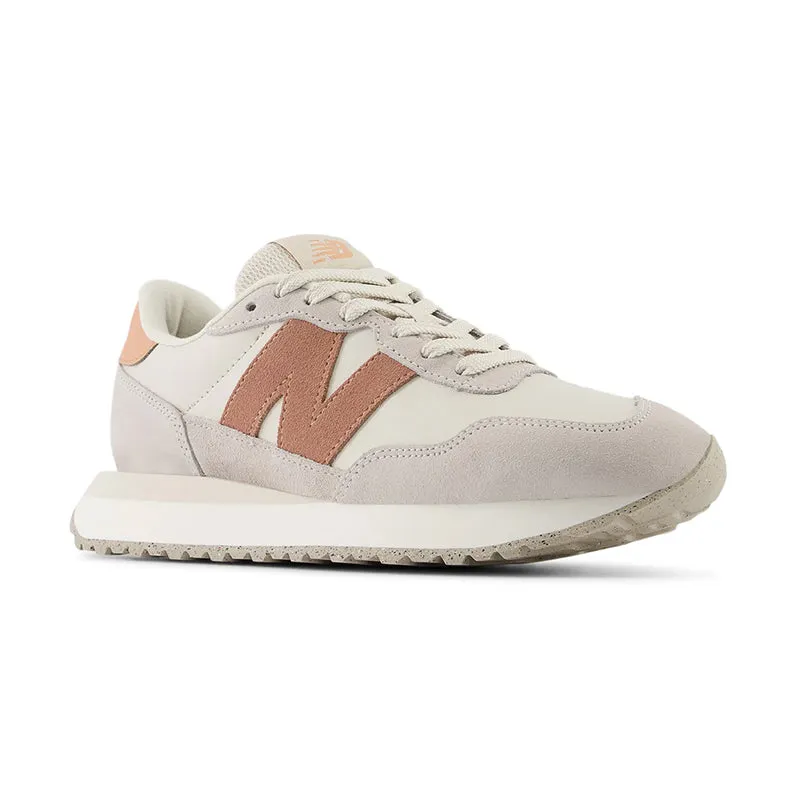 Women's 237 White/Pink New Balance 9060 Sun Glow Team Sky Blue